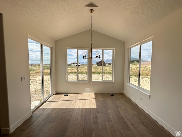 287 E 1150 N Unit 73, Salem, UT 84653 - unfurnished sunroom with a chandelier and vaulted ceiling