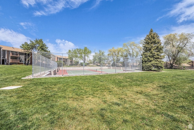 4169 S Village Ln Unit A, Taylorsville, UT 84129 - view of sport court featuring a yard and fence