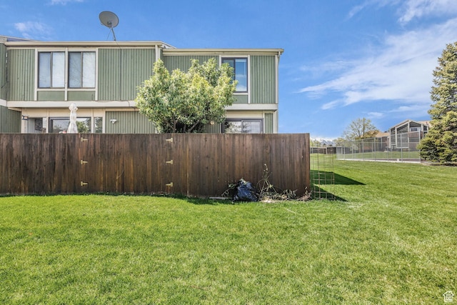 4169 S Village Ln Unit A, Taylorsville, UT 84129 - view of yard featuring fence