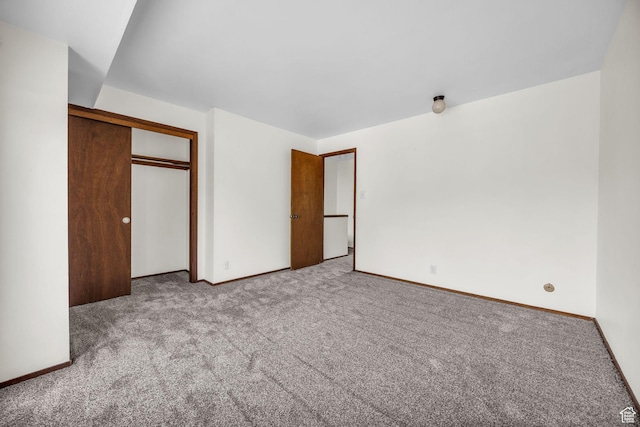 4169 S Village Ln Unit A, Taylorsville, UT 84129 - unfurnished bedroom with baseboards, carpet floors, and a closet