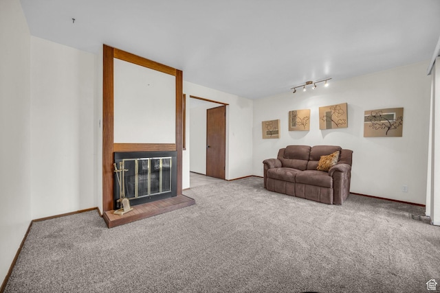 4169 S Village Ln Unit A, Taylorsville, UT 84129 - carpeted living room with baseboards and rail lighting