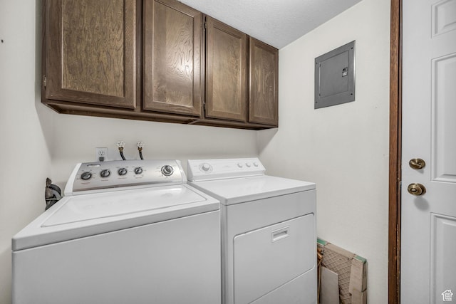 4169 S Village Ln Unit A, Taylorsville, UT 84129 - laundry room with separate washer and dryer, electric panel, cabinet space, and a textured ceiling