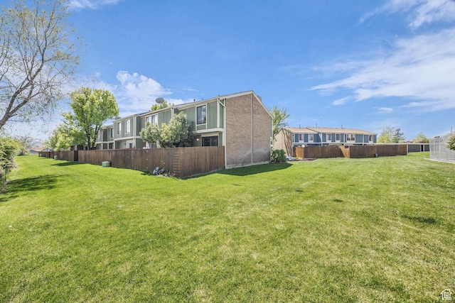 4169 S Village Ln Unit A, Taylorsville, UT 84129 - view of yard featuring fence