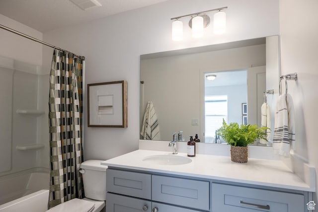 4479 S 500 E Unit 65, Millcreek, UT 84107 - bathroom with toilet, visible vents, vanity, and shower / bath combination with curtain