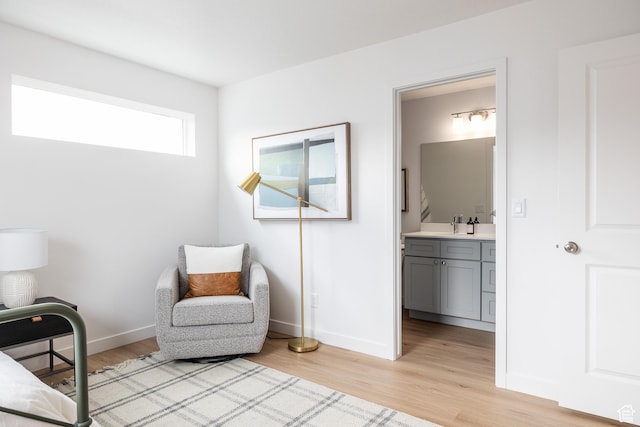 4479 S 500 E Unit 65, Millcreek, UT 84107 - sitting room with light wood-style flooring and baseboards