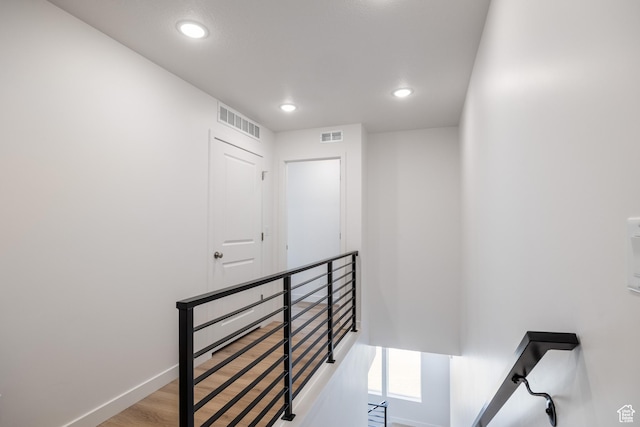 4479 S 500 E Unit 65, Millcreek, UT 84107 - stairs with recessed lighting, visible vents, wood finished floors, and baseboards
