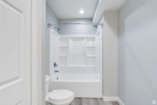 4867 N Canaan Peak Dr W, Eagle Mountain, UT 84005 - full bathroom with toilet, wood finished floors, and shower / tub combination