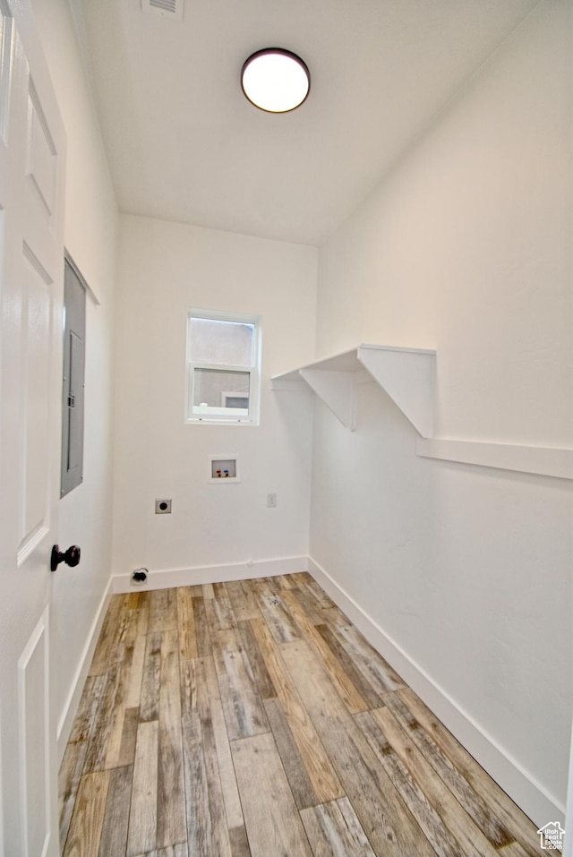 2041 S 750 E, Lehi, UT 84043 - washroom featuring hookup for a washing machine, laundry area, light wood-style floors, hookup for an electric dryer, and baseboards