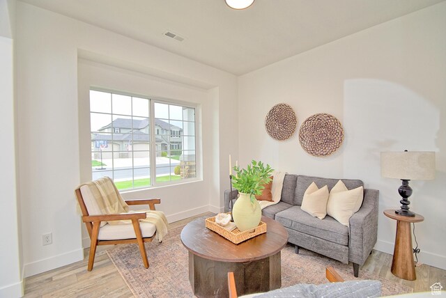 2041 S 750 E, Lehi, UT 84043 - living area with visible vents, baseboards, and light wood-style floors