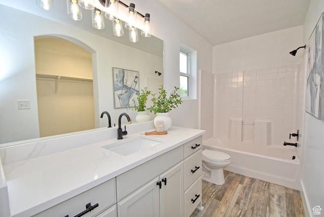 2041 S 750 E, Lehi, UT 84043 - full bath featuring wood finished floors, toilet, shower / bathtub combination, vanity, and a spacious closet