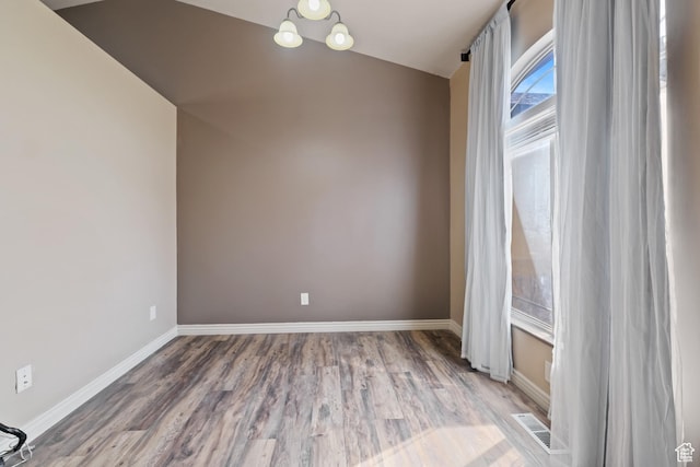 680 N 980 W, Tremonton, UT 84337 - spare room featuring visible vents, wood finished floors, and baseboards