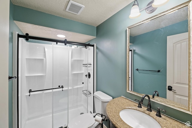 680 N 980 W, Tremonton, UT 84337 - full bath with toilet, vanity, visible vents, a stall shower, and a textured ceiling