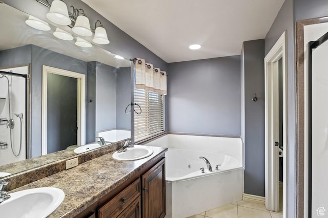 680 N 980 W, Tremonton, UT 84337 - bathroom with a tub with jets, tile patterned flooring, and a sink