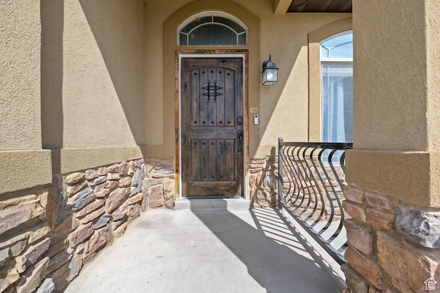 680 N 980 W, Tremonton, UT 84337 - property entrance featuring stucco siding and stone siding