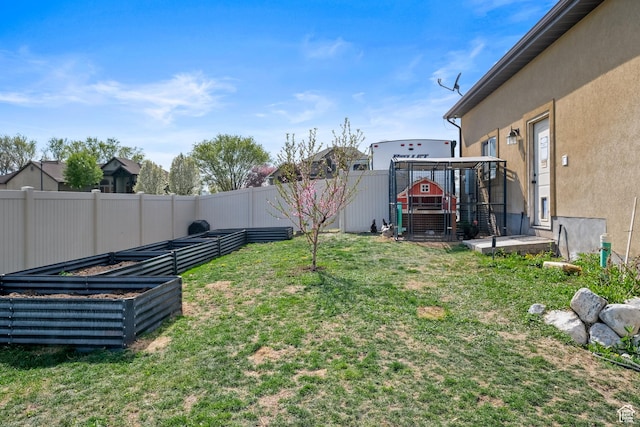 680 N 980 W, Tremonton, UT 84337 - view of yard with a fenced backyard and a vegetable garden