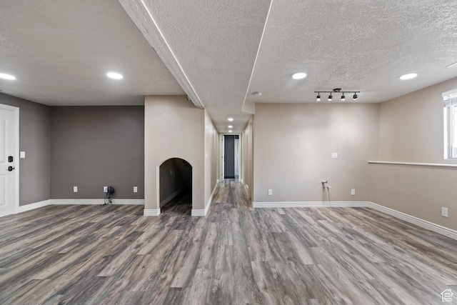 680 N 980 W, Tremonton, UT 84337 - below grade area featuring recessed lighting, a textured ceiling, wood finished floors, and baseboards