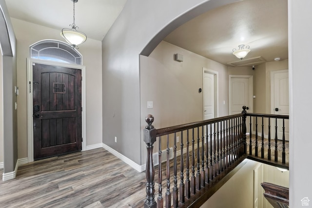 680 N 980 W, Tremonton, UT 84337 - foyer entrance featuring baseboards, arched walkways, and wood finished floors