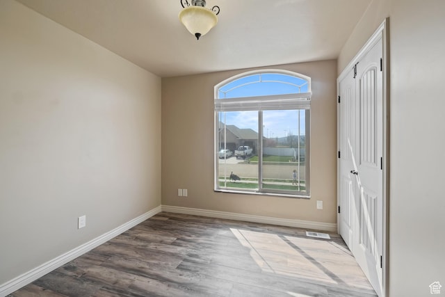 680 N 980 W, Tremonton, UT 84337 - unfurnished bedroom with a closet, visible vents, wood finished floors, and baseboards