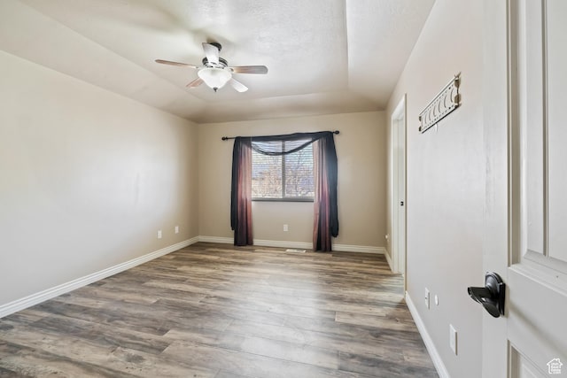 680 N 980 W, Tremonton, UT 84337 - spare room with baseboards, wood finished floors, and a ceiling fan