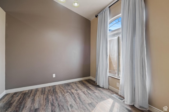 680 N 980 W, Tremonton, UT 84337 - spare room featuring visible vents, wood finished floors, and baseboards