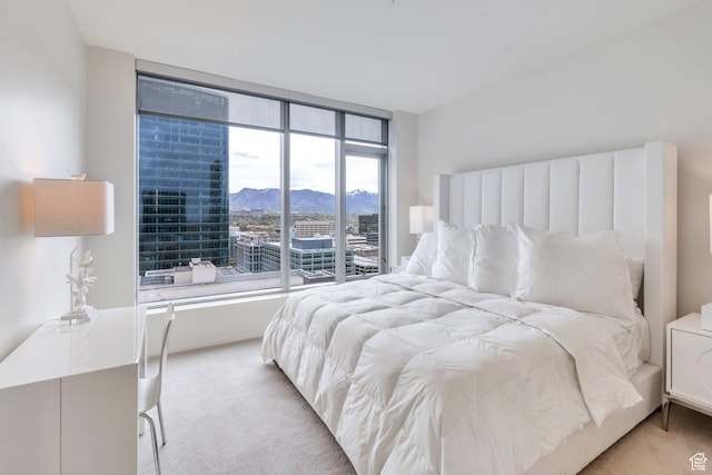 35 E 100 S Unit 1504, Salt Lake City, UT 84111 - bedroom featuring a mountain view and carpet