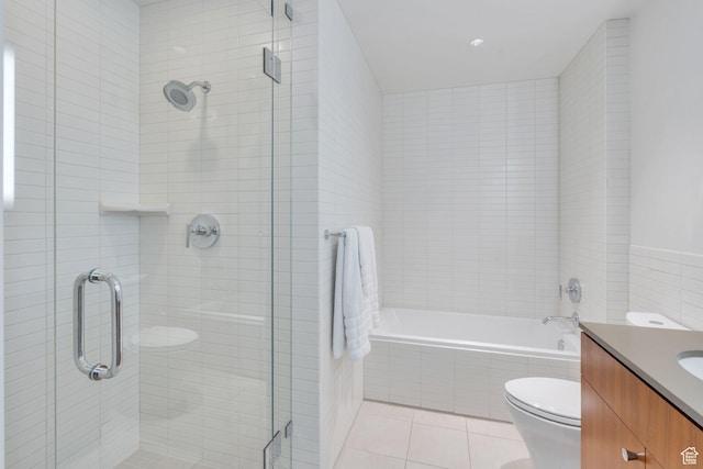 35 E 100 S Unit 1504, Salt Lake City, UT 84111 - full bath featuring a relaxing tiled tub, vanity, toilet, a stall shower, and tile patterned flooring