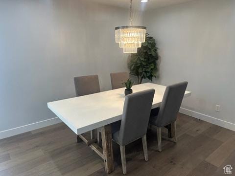 560 E S Temple St S Unit 302, Salt Lake City, UT 84102 - dining space featuring a chandelier and wood finished floors