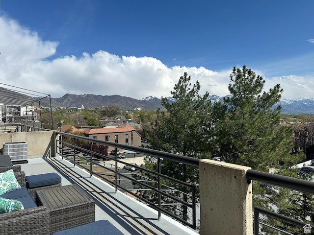 560 E S Temple St S Unit 302, Salt Lake City, UT 84102 - balcony with a mountain view and central air condition unit