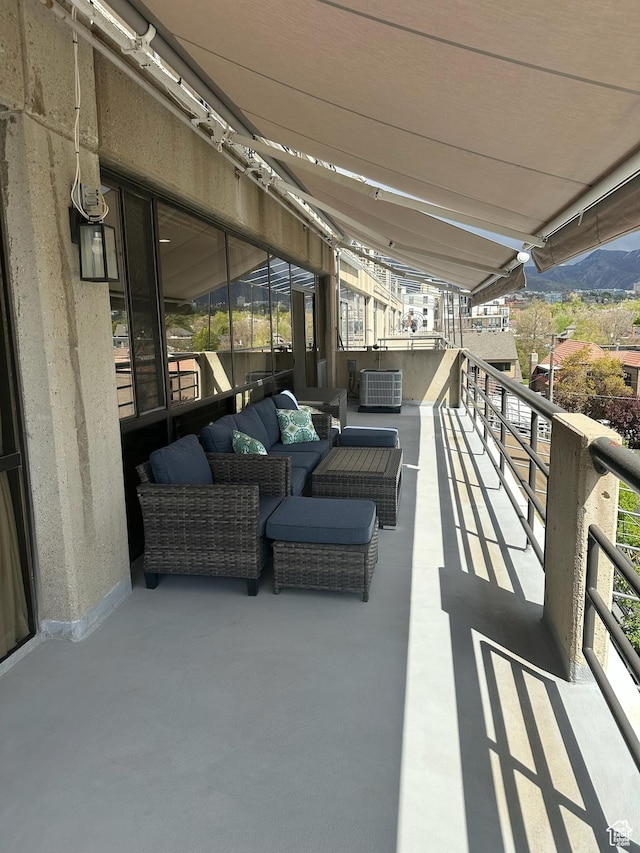 560 E S Temple St S Unit 302, Salt Lake City, UT 84102 - balcony with cooling unit and an outdoor living space