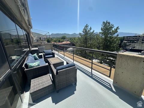 560 E S Temple St S Unit 302, Salt Lake City, UT 84102 - balcony featuring a mountain view and an outdoor hangout area