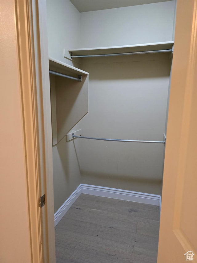 12075 S Draper Ridge Dr, Draper, UT 84020 - walk in closet featuring wood finished floors