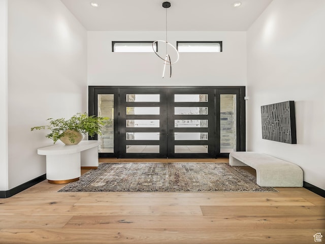 897 S Summit Creek Dr, Woodland Hills, UT 84653 - foyer featuring baseboards, wood finished floors, and a high ceiling