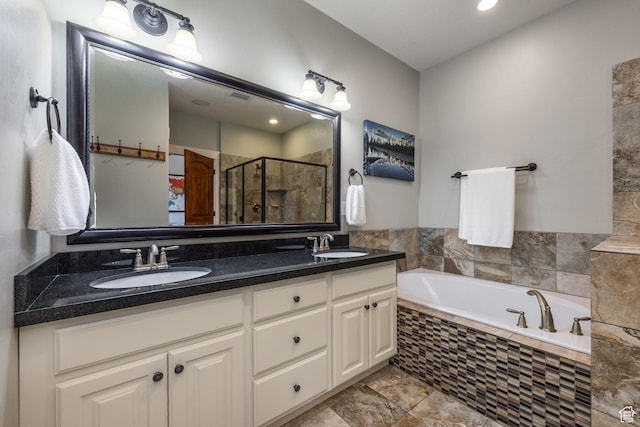 13386 N Alexis Dr, Kamas, UT 84036 - bathroom featuring double vanity, a stall shower, a bath, and recessed lighting