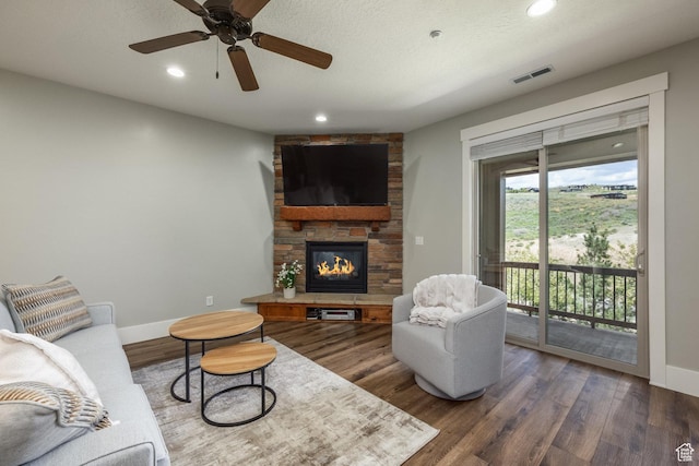 13386 N Alexis Dr, Kamas, UT 84036 - living area with a fireplace, wood finished floors, recessed lighting, and a ceiling fan