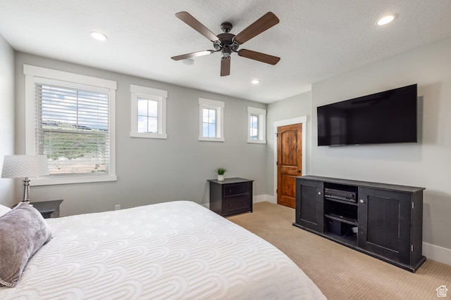 13386 N Alexis Dr, Kamas, UT 84036 - bedroom with light colored carpet, recessed lighting, a textured ceiling, and ceiling fan