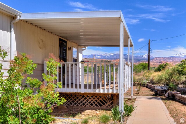 1575 Rocky Rd, Moab, UT 84532 - deck with a mountain view and a carport