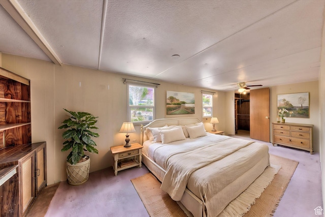 1575 Rocky Rd, Moab, UT 84532 - bedroom with a ceiling fan and a textured ceiling
