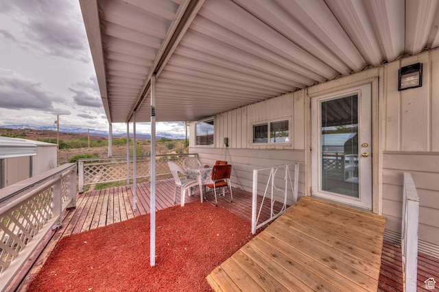 1575 Rocky Rd, Moab, UT 84532 - wooden terrace featuring a mountain view