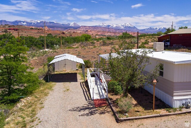 1575 Rocky Rd, Moab, UT 84532 - birds eye view of property featuring a mountain view