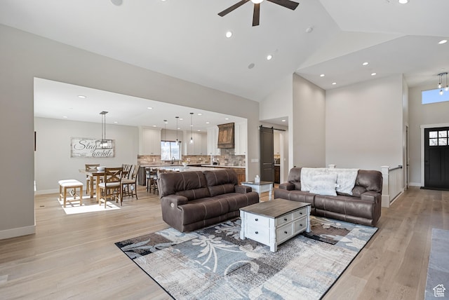 9313 E Deer Creek Dr S Unit 965, Heber City, UT 84032 - living area with light wood-type flooring, high vaulted ceiling, and ceiling fan