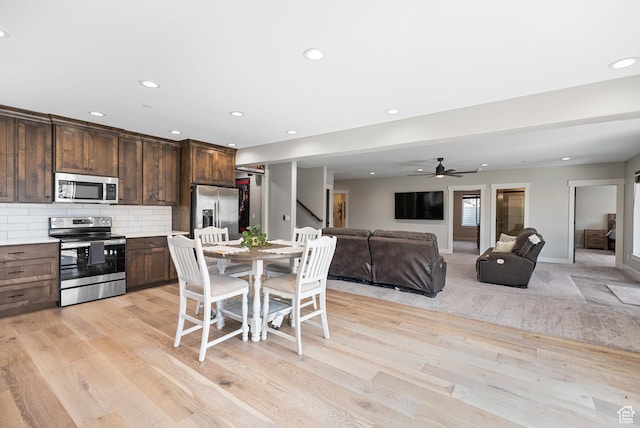 9313 E Deer Creek Dr S Unit 965, Heber City, UT 84032 - dining room featuring recessed lighting, stairs, ceiling fan, baseboards, and light wood-type flooring