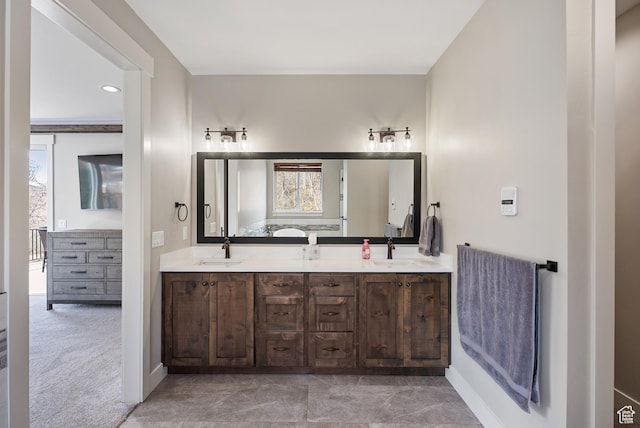 9313 E Deer Creek Dr S Unit 965, Heber City, UT 84032 - bathroom featuring double vanity, baseboards, and a sink