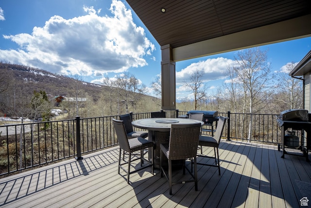 9313 E Deer Creek Dr S Unit 965, Heber City, UT 84032 - wooden deck with area for grilling, a mountain view, and outdoor dining area