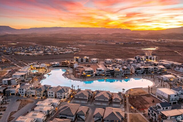 5801 S Garnet Dr Unit 2-301, St George, UT 84790 - aerial view at dusk featuring a mountain view and a residential view