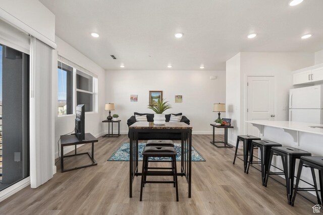 5801 S Garnet Dr Unit 2-301, St George, UT 84790 - dining room with baseboards, recessed lighting, and light wood finished floors