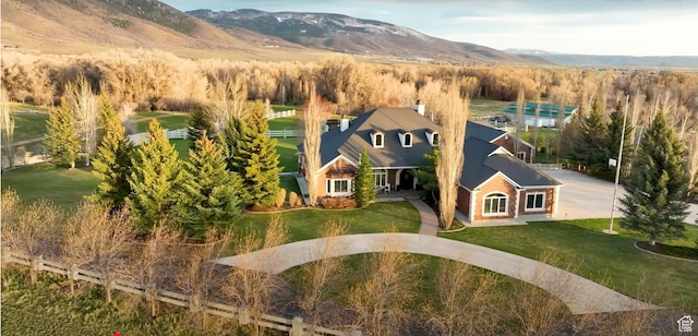 drone / aerial view featuring a mountain view