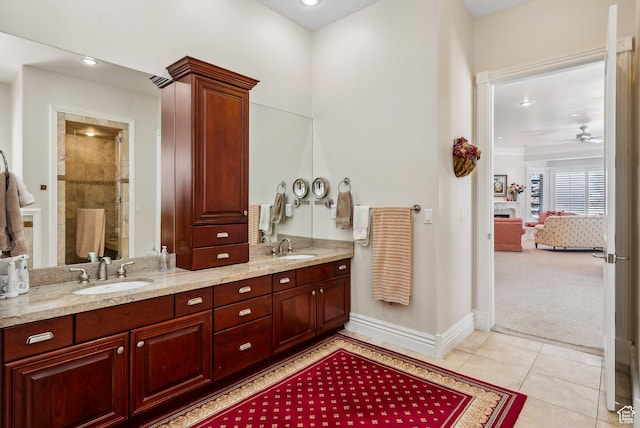 189 E Weber Canyon Rd, Oakley, UT 84055 - full bathroom featuring baseboards, double vanity, ceiling fan, and a sink
