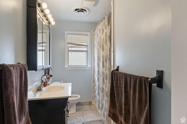 full bathroom with vanity, toilet, tile patterned floors, curtained shower, and visible vents