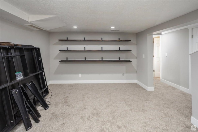 3048 S Harrison Blvd, Ogden, UT 84403 - finished basement with carpet floors, a textured ceiling, recessed lighting, and baseboards
