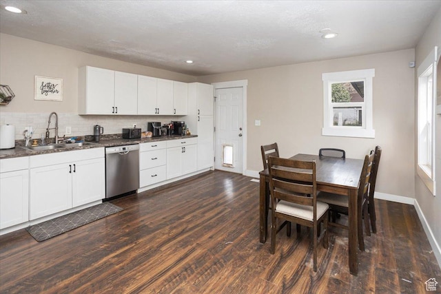 3048 S Harrison Blvd, Ogden, UT 84403 - kitchen featuring dark wood-type flooring, dishwasher, baseboards, and a sink